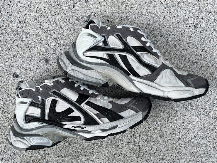 Grey, White, and Black Runners