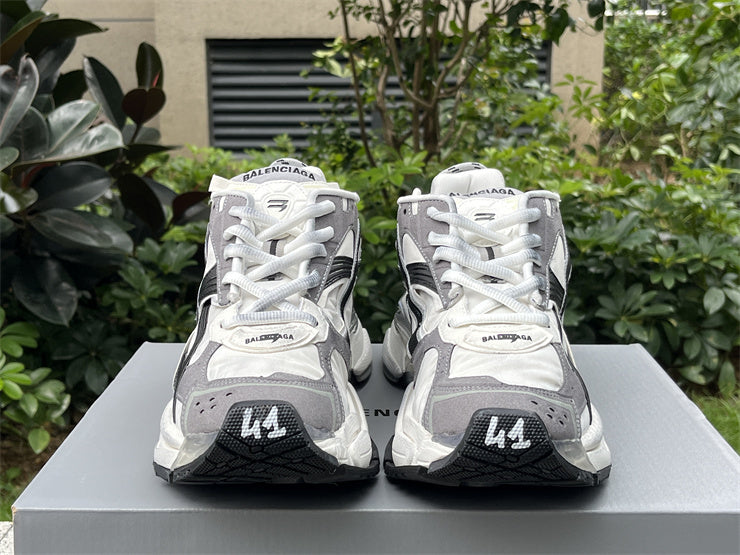 Grey, White, and Black Runners