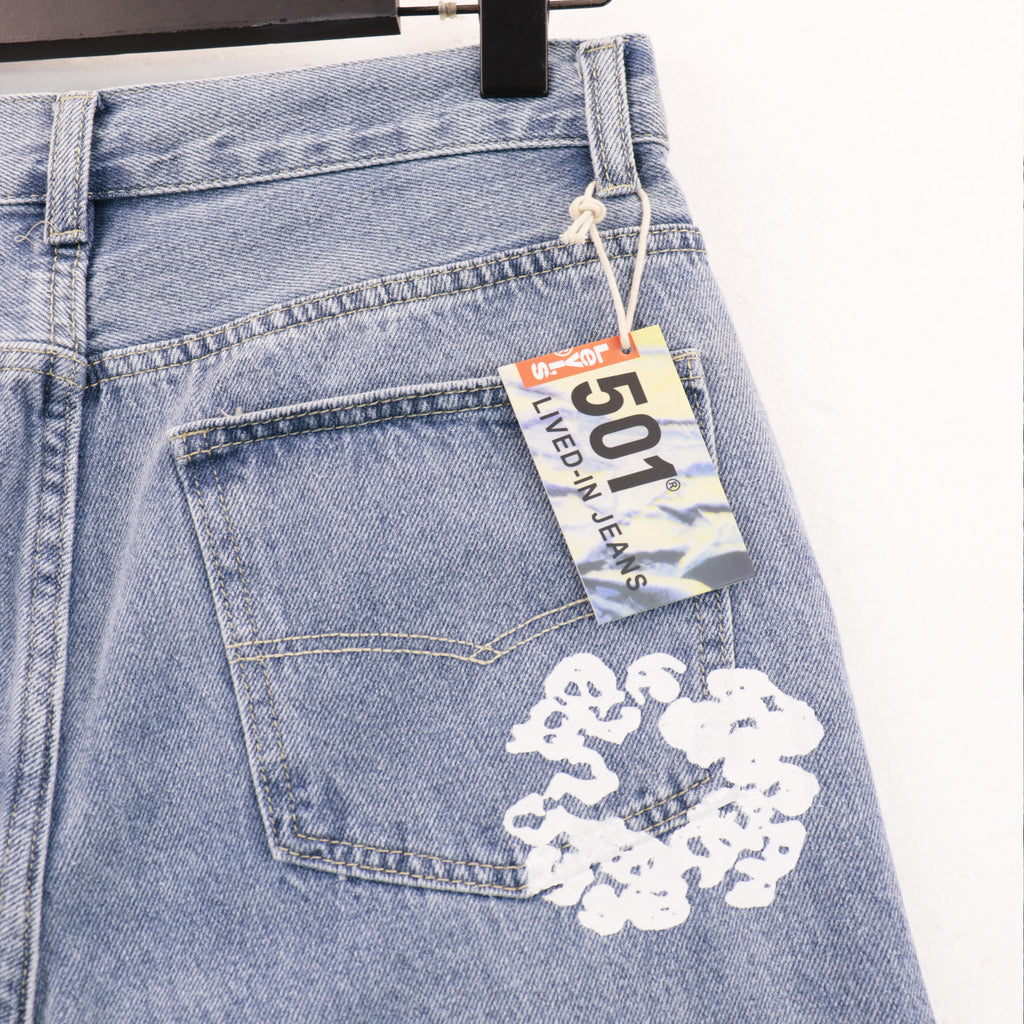 Offset Tears Jeans
