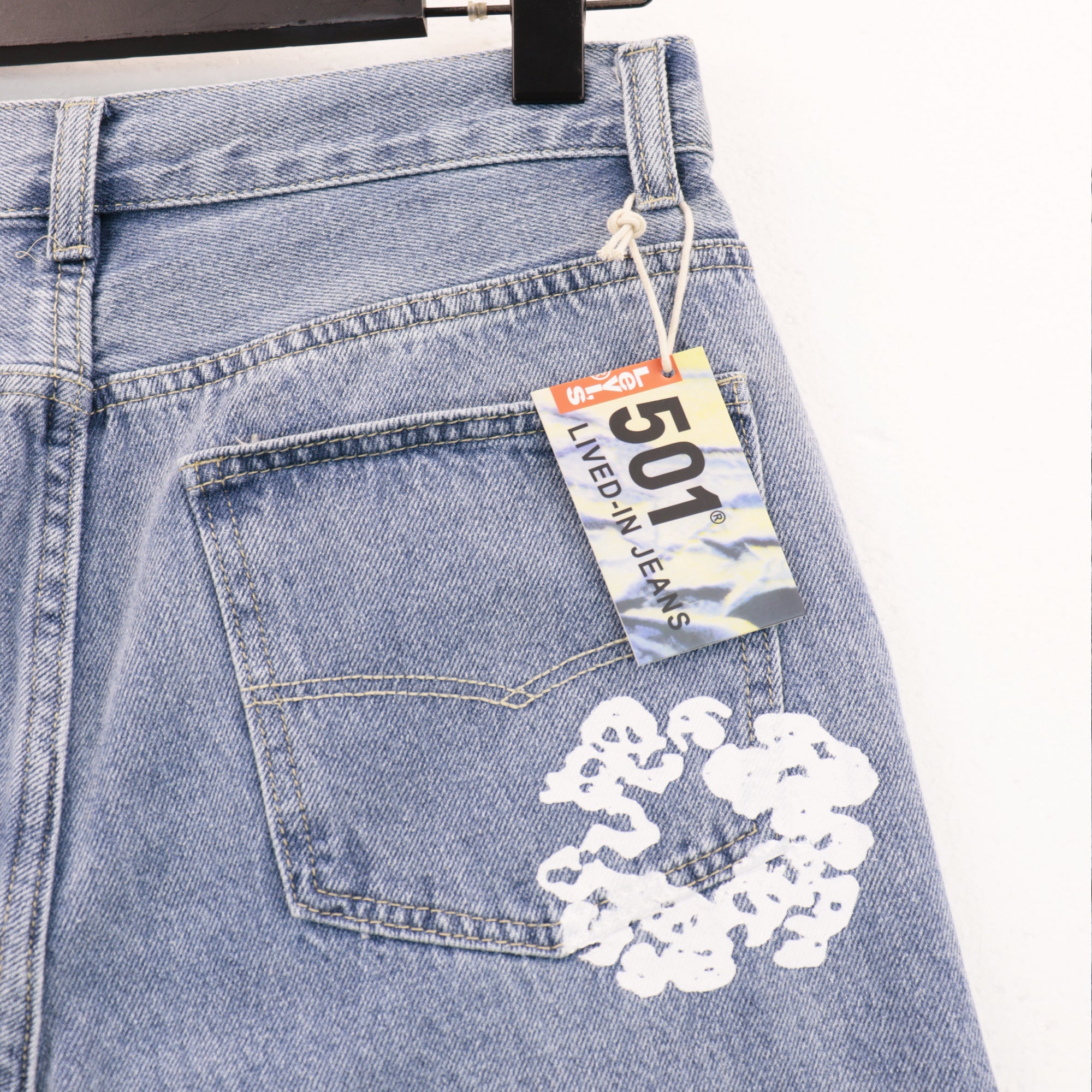 Offset Tears Jeans