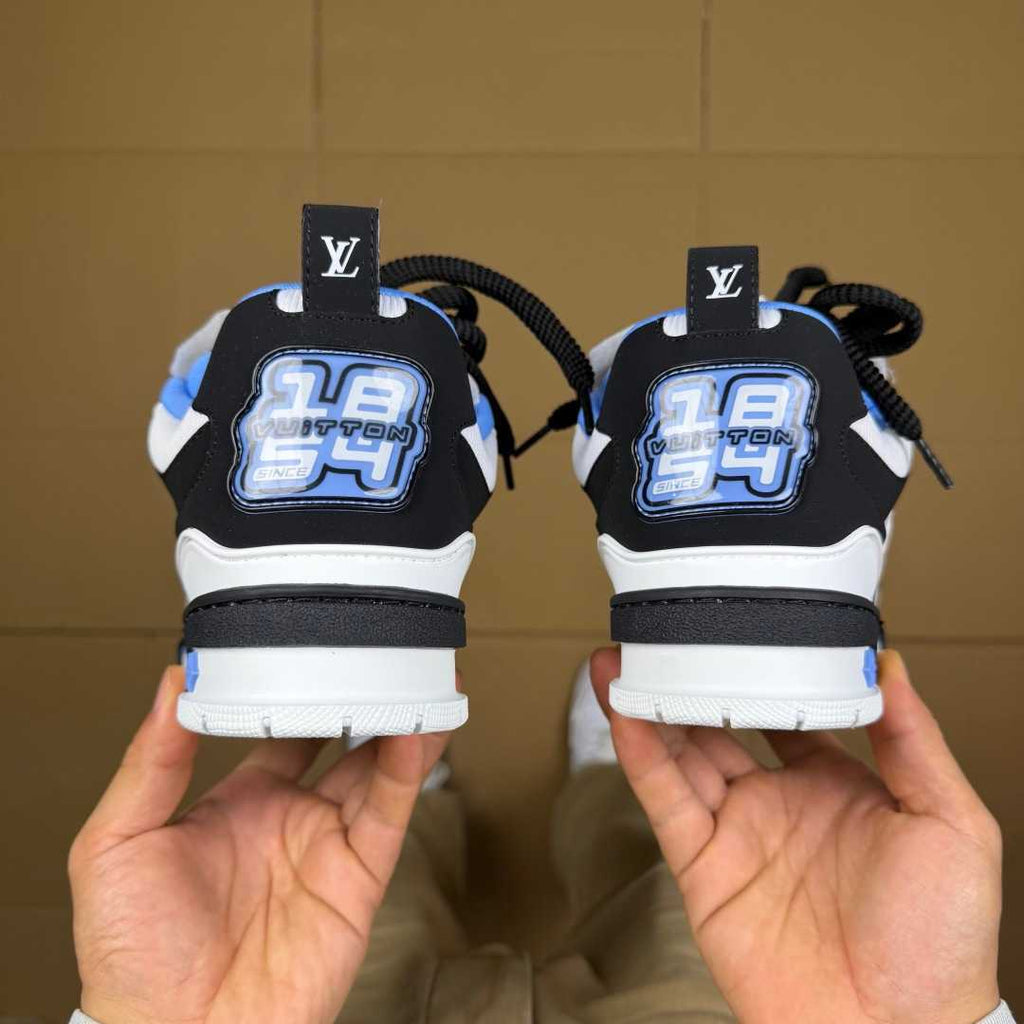 Blue, White, and Black Skates