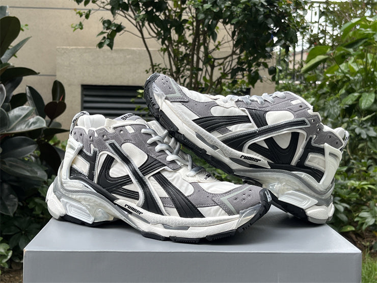 Grey, White, and Black Runners