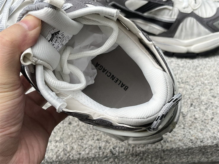 Grey, White, and Black Runners