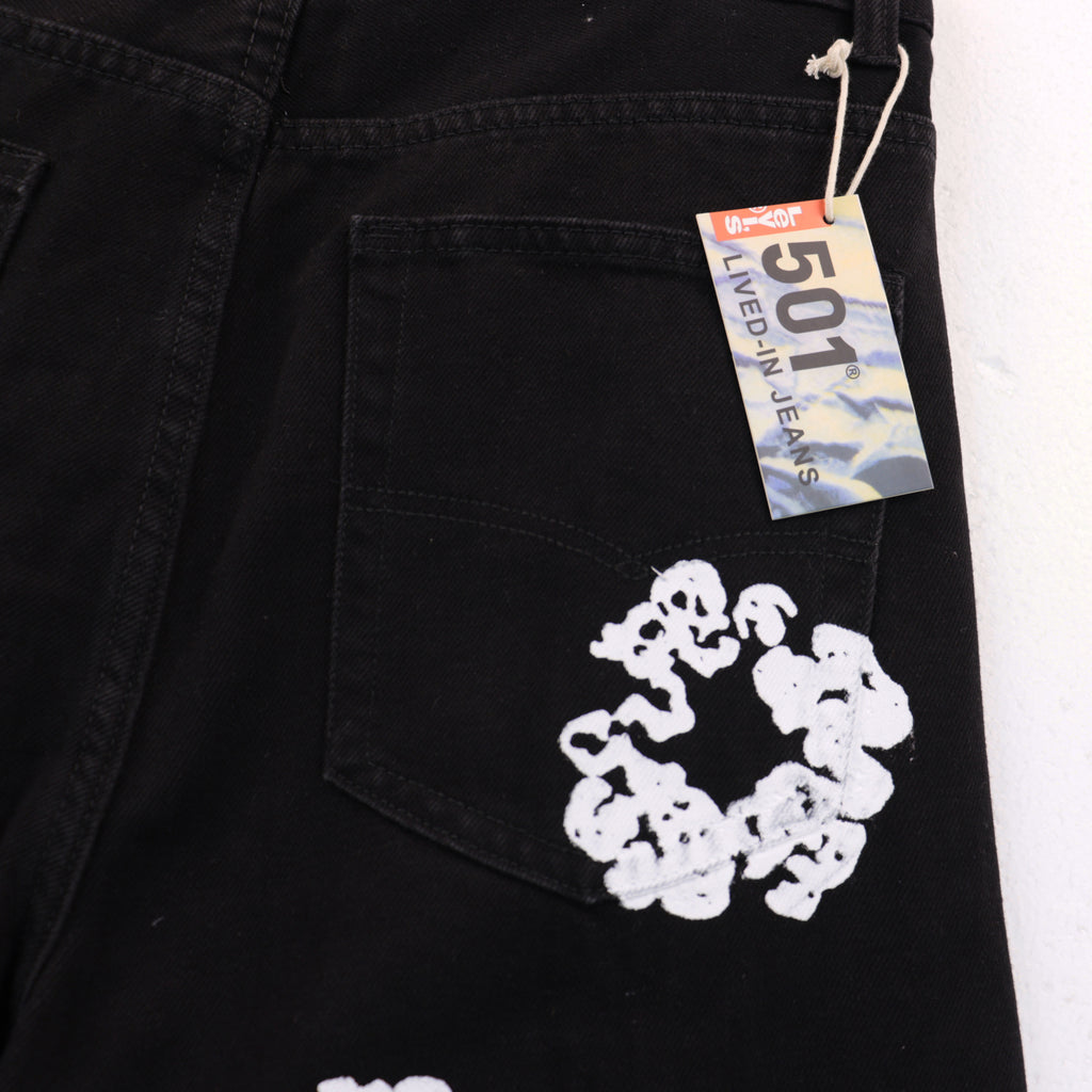 Offset Tears Jeans