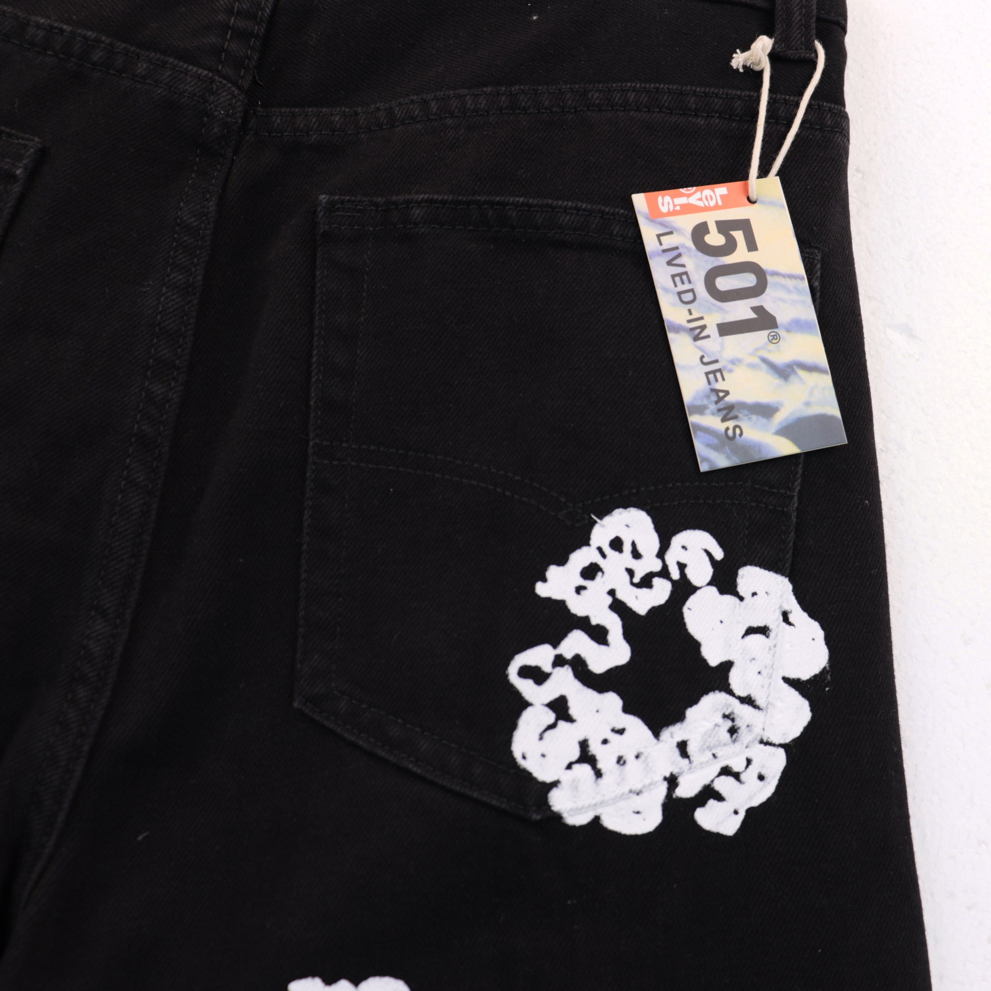 Offset Tears Jeans