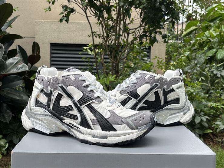 Grey, White, and Black Runners