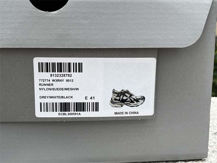 Grey, White, and Black Runners