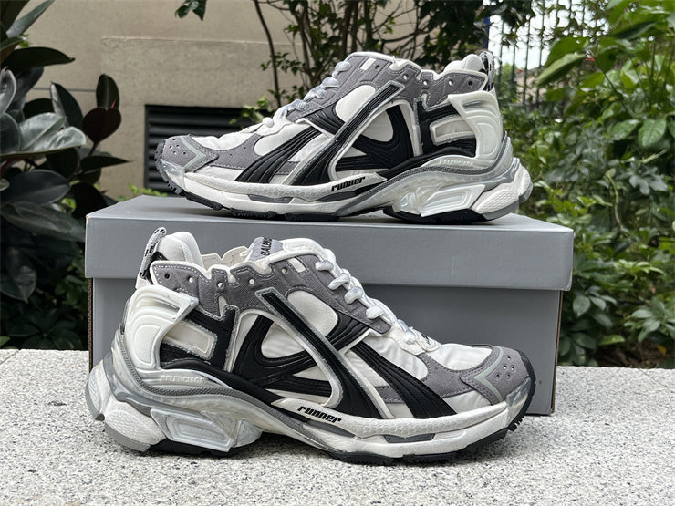 Grey, White, and Black Runners