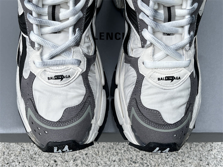 Grey, White, and Black Runners