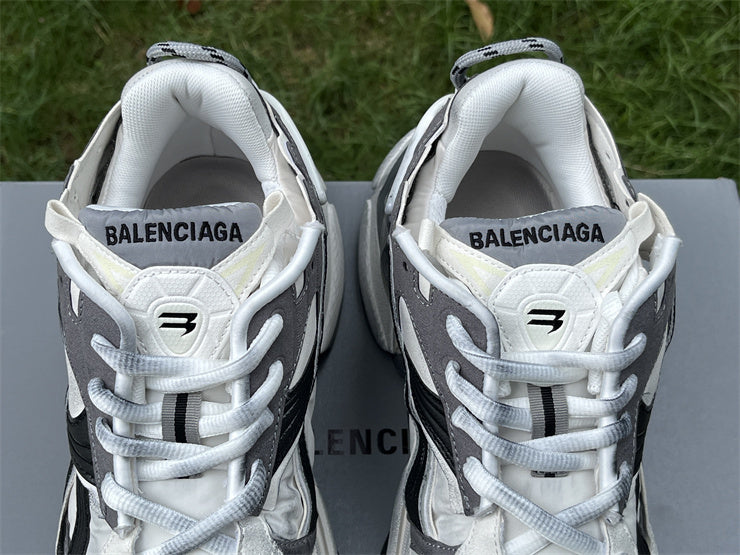 Grey, White, and Black Runners