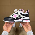 Pink, White, and Black Skates