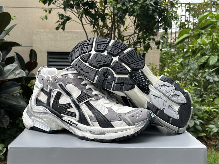 Grey, White, and Black Runners