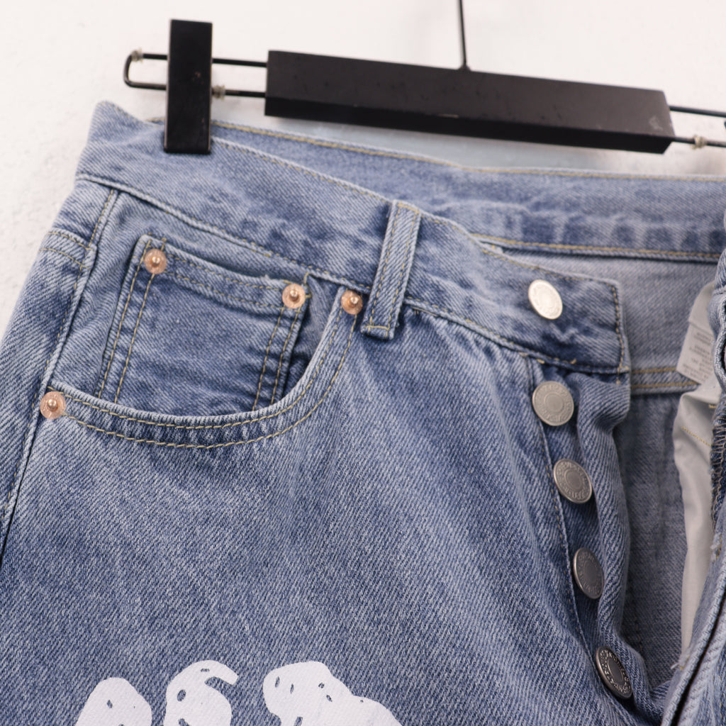 Offset Tears Jeans